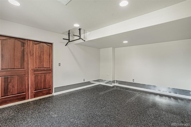 10272 Greenfield Cir, Parker, CO 80134 - garage with recessed lighting and baseboards