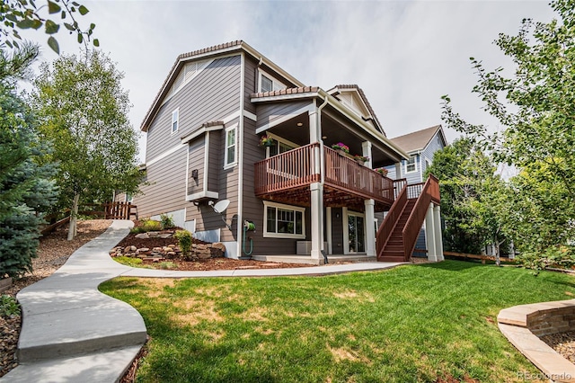10272 Greenfield Cir, Parker, CO 80134 - back of house featuring a yard, stairway, a wooden deck, and a patio