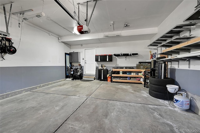 garage featuring a garage door opener
