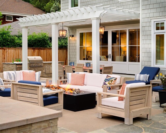 2130 S Milwaukee St, Denver, CO 80210 - view of patio with an outdoor living space with a fire pit, fence, a pergola, and a grill