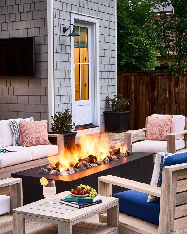 2130 S Milwaukee St, Denver, CO 80210 - view of patio with fence and an outdoor fire pit
