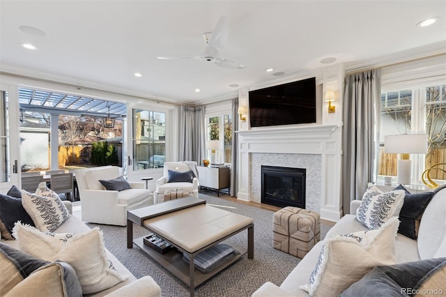 2130 S Milwaukee St, Denver, CO 80210 - living area featuring ceiling fan, a healthy amount of sunlight, ornamental molding, and recessed lighting