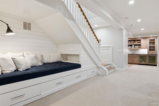 2130 S Milwaukee St, Denver, CO 80210 - unfurnished bedroom featuring visible vents, recessed lighting, wine cooler, wet bar, and light colored carpet