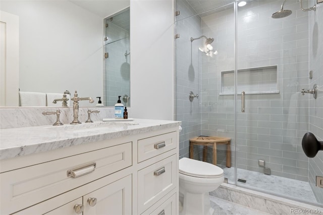 2130 S Milwaukee St, Denver, CO 80210 - full bathroom with vanity, toilet, and a stall shower