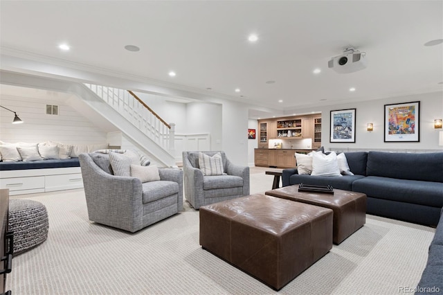 2130 S Milwaukee St, Denver, CO 80210 - living room featuring stairway, light colored carpet, ornamental molding, bar, and recessed lighting