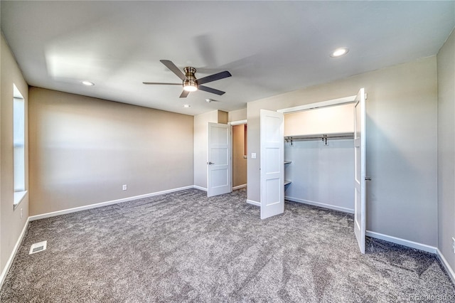 unfurnished bedroom featuring ceiling fan, carpet floors, and a closet