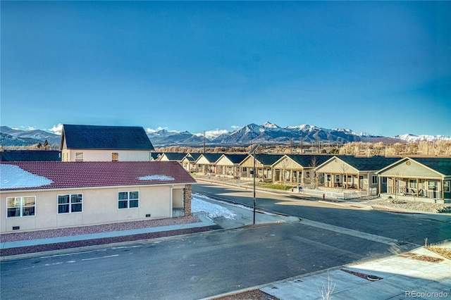 view of swimming pool featuring a mountain view