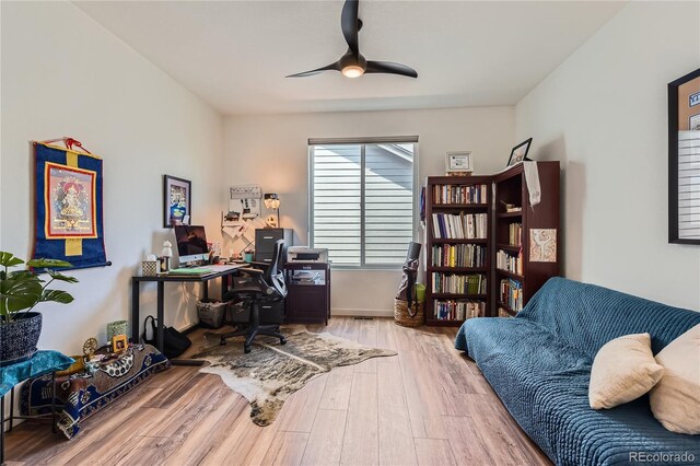 11253 Moondance Trl, Littleton, CO 80125 - home office with wood finished floors and ceiling fan