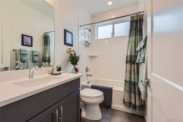 11253 Moondance Trl, Littleton, CO 80125 - bathroom featuring vanity, toilet, shower / tub combo, and tile patterned floors