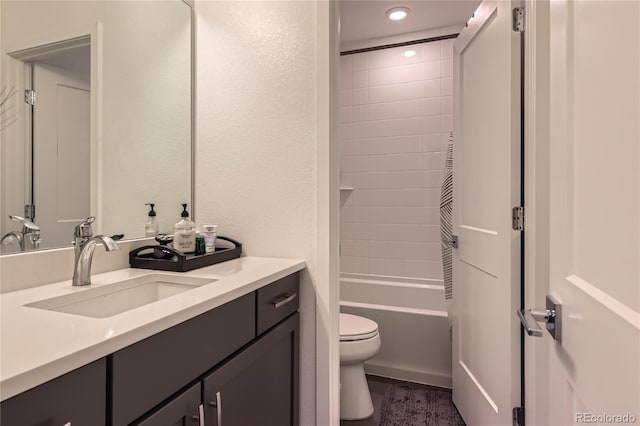 11253 Moondance Trl, Littleton, CO 80125 - bathroom with vanity, toilet, shower / bathtub combination, recessed lighting, and a textured wall