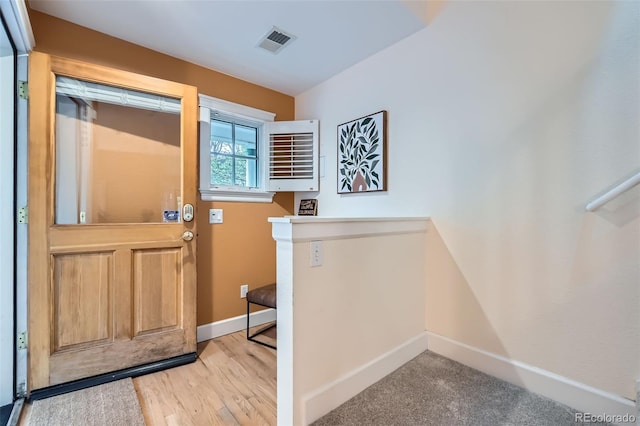 753 Pearl St, Boulder, CO 80302 - entryway featuring baseboards and wood finished floors