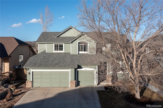 front of property with a garage