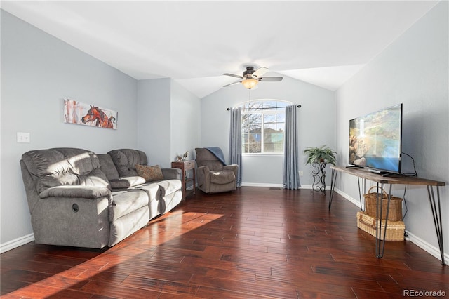 living room with ceiling fan, dark hardwood / wood-style flooring, and vaulted ceiling