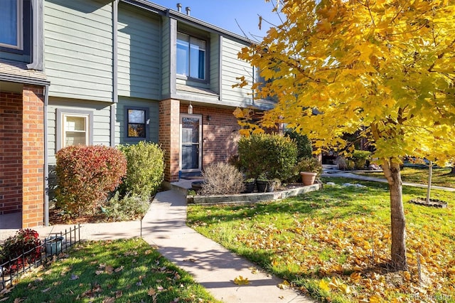 exterior space with a front yard