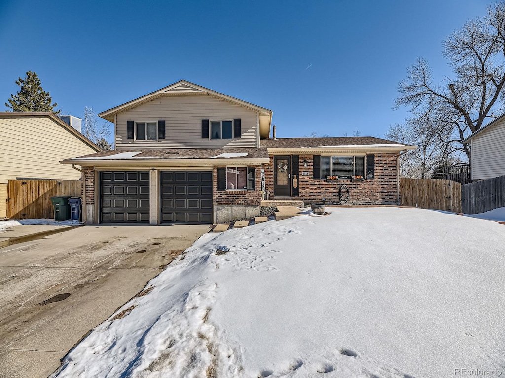 view of front of home with a garage