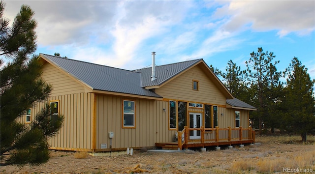 59 Whip Way, Hartsel, CO 80449 - back of house with french doors, board and batten siding, a deck, and metal roof