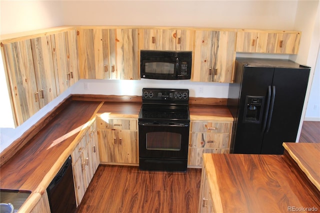 59 Whip Way, Hartsel, CO 80449 - kitchen with black appliances, wooden counters, light brown cabinets, and dark wood-style floors