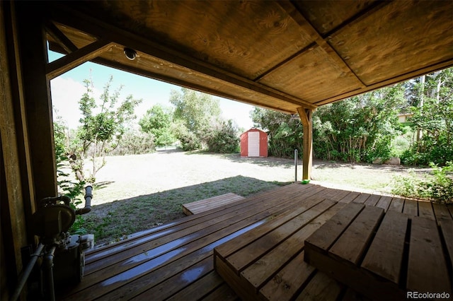 deck with a storage shed