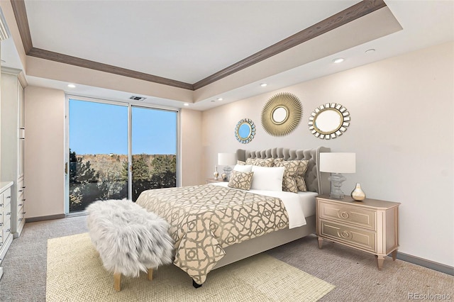 bedroom with light colored carpet, crown molding, a raised ceiling, and access to outside