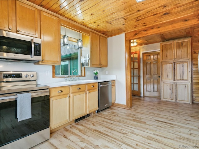 6066 Crawford Gulch Rd, Golden, CO 80403 - kitchen featuring appliances with stainless steel finishes, a sink, wooden ceiling, light countertops, and light wood-type flooring