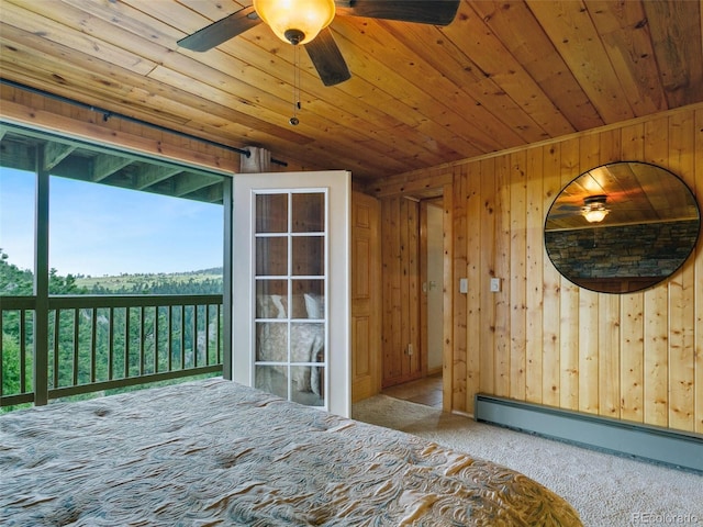 6066 Crawford Gulch Rd, Golden, CO 80403 - bedroom featuring carpet flooring, baseboard heating, wood walls, and wood ceiling
