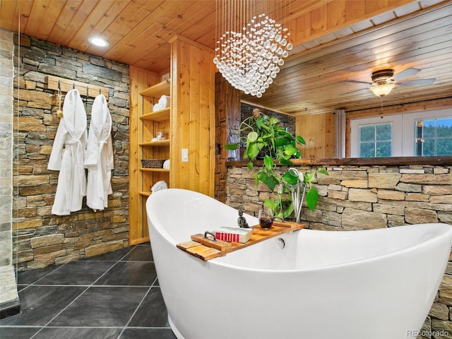 6066 Crawford Gulch Rd, Golden, CO 80403 - full bath with wood ceiling, a freestanding tub, a ceiling fan, and wood walls