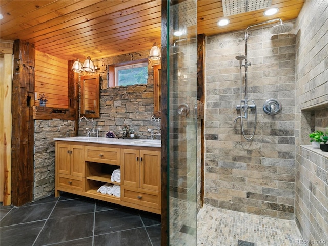 6066 Crawford Gulch Rd, Golden, CO 80403 - full bath featuring wood ceiling, double vanity, a stall shower, and tile patterned flooring