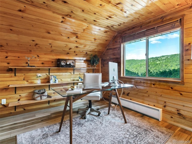 6066 Crawford Gulch Rd, Golden, CO 80403 - office area featuring baseboard heating, wood walls, vaulted ceiling, wood ceiling, and wood finished floors