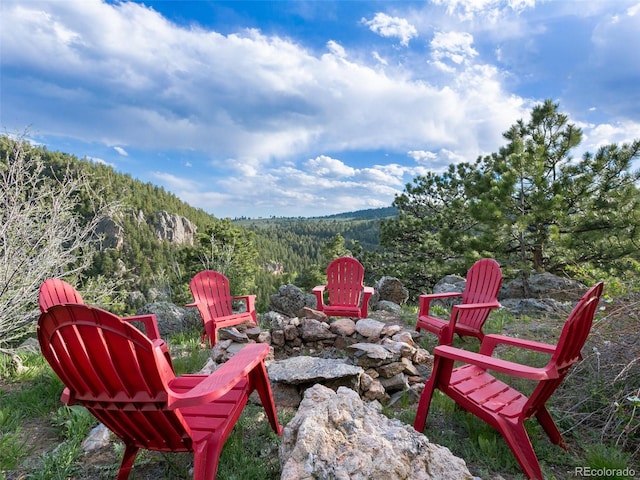 6066 Crawford Gulch Rd, Golden, CO 80403 - view of patio with a view of trees