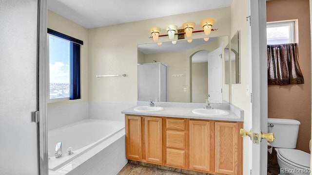 5483 Ben Park Cir, Parker, CO 80134 - bathroom featuring a garden tub and double vanity