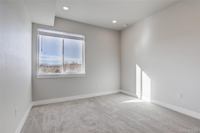 view of carpeted spare room