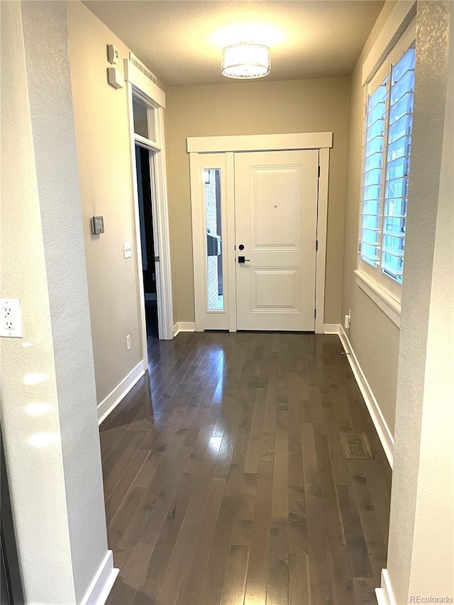 interior space featuring dark hardwood / wood-style flooring