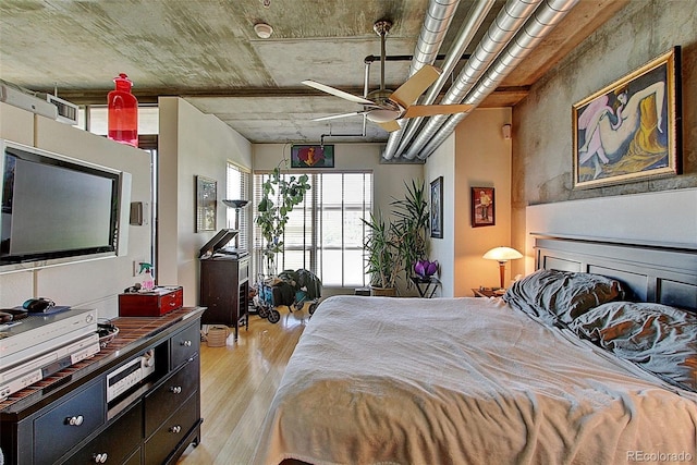 bedroom featuring ceiling fan and light wood-type flooring