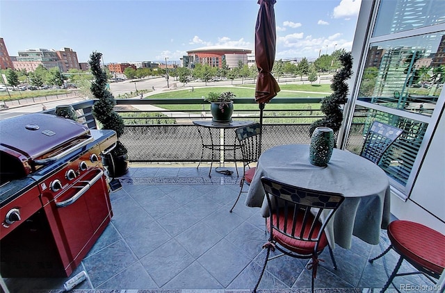 view of patio / terrace featuring a balcony and grilling area