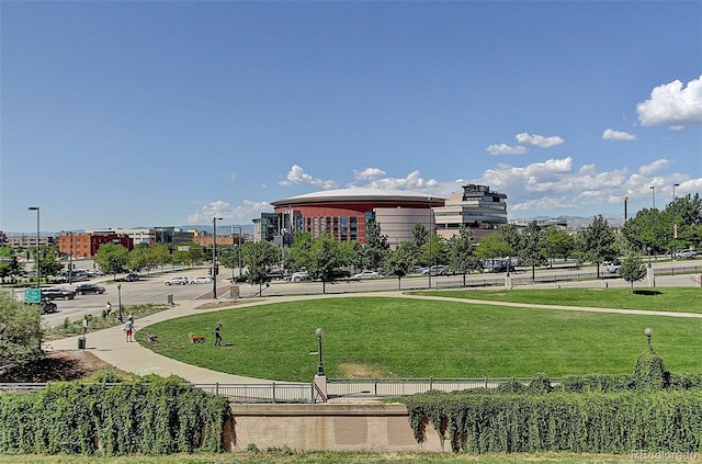 view of property's community with a lawn