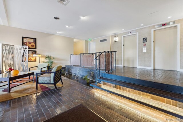 4570 E Yale Ave Unit 706, Denver, CO 80222 - building lobby featuring visible vents