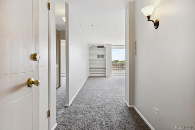 hallway featuring carpet