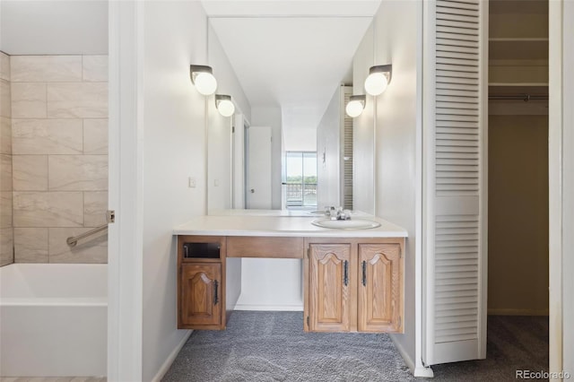 bathroom with vanity and a bathing tub