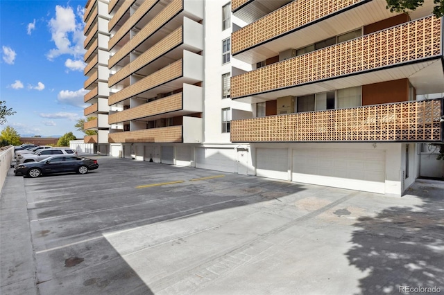 4570 E Yale Ave Unit 706, Denver, CO 80222 - view of building exterior featuring uncovered parking