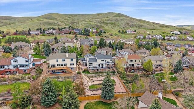 aerial view with a mountain view and a residential view