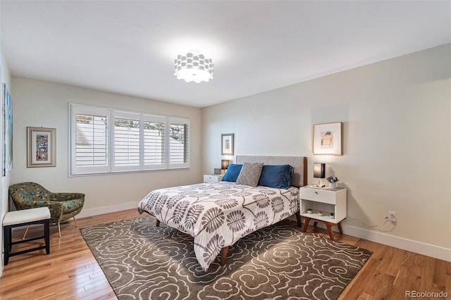 bedroom featuring wood-type flooring