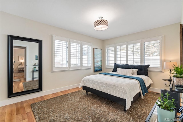 bedroom featuring wood-type flooring