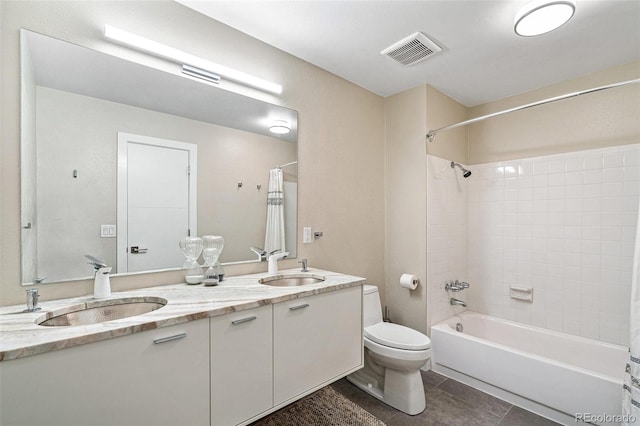 full bathroom with tile patterned flooring, toilet, vanity, and shower / tub combo with curtain