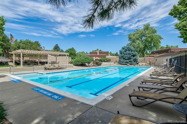 view of pool featuring a patio area and a pergola