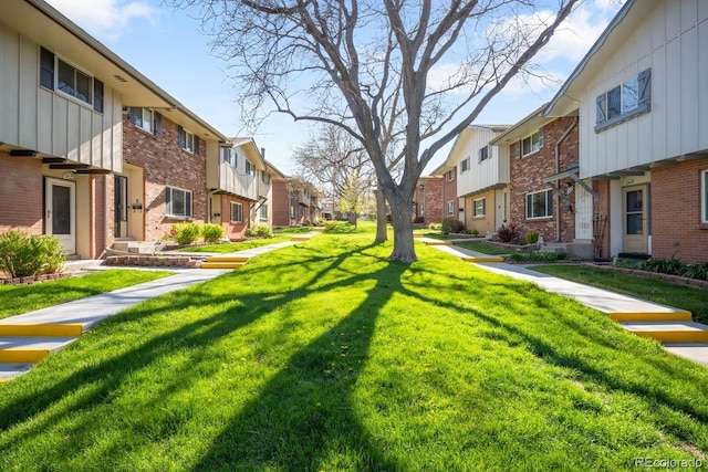 12648 W Virginia Ave, Lakewood, CO 80228 - view of home's community with a yard and a residential view