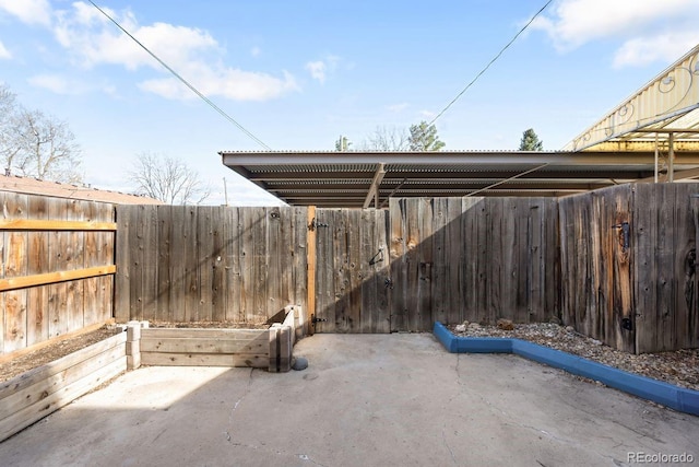 12648 W Virginia Ave, Lakewood, CO 80228 - view of patio with fence