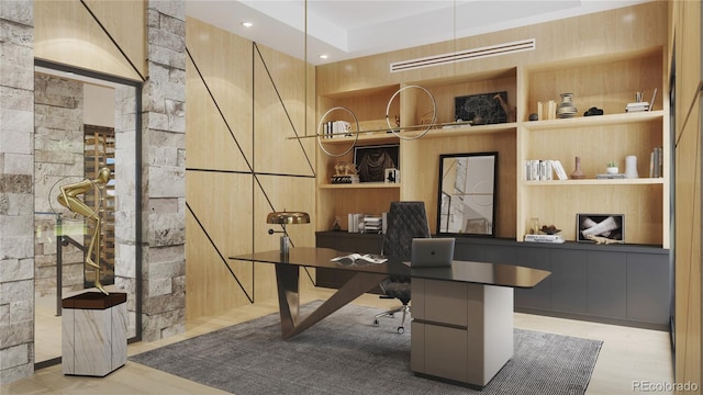 office featuring built in features and light wood-type flooring