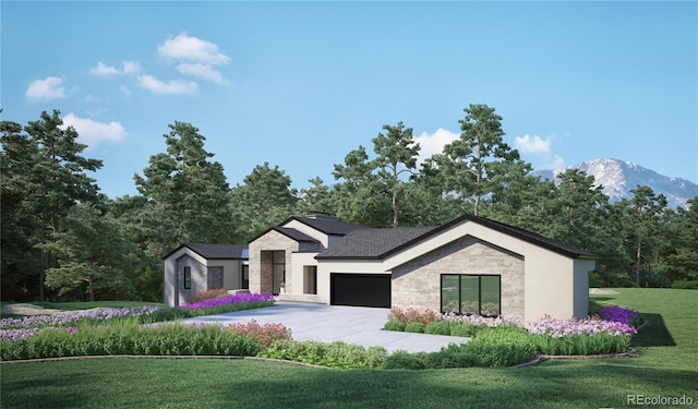 view of front of property featuring a mountain view, a garage, and a front yard