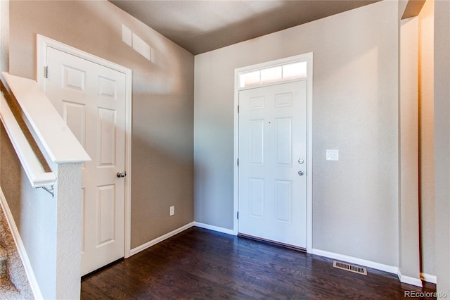 foyer featuring dark hardwood / wood-style floors