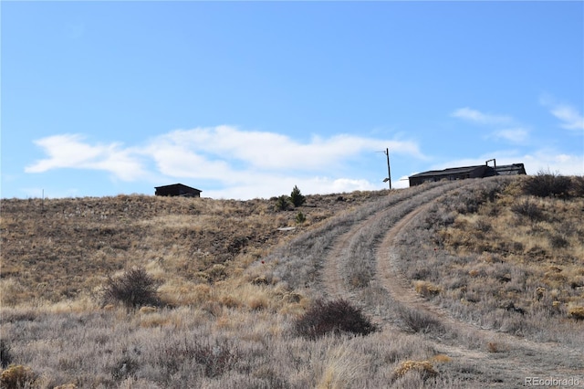 view of road with a rural view